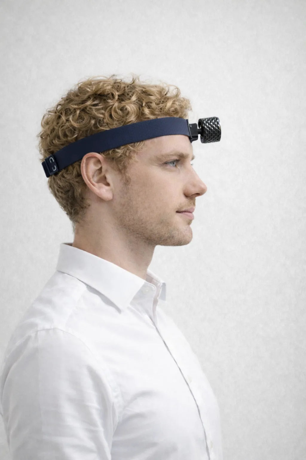 Person wearing a Midnight Blue HeadX Duo, side view.